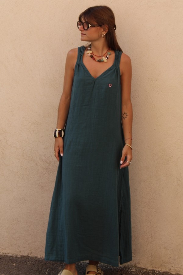 Peacock-colored dress with straps